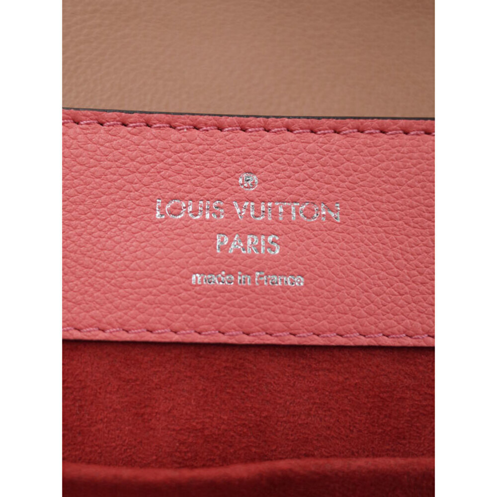 Louis Vuitton Lock Me Backpack - Picture 8 of 9